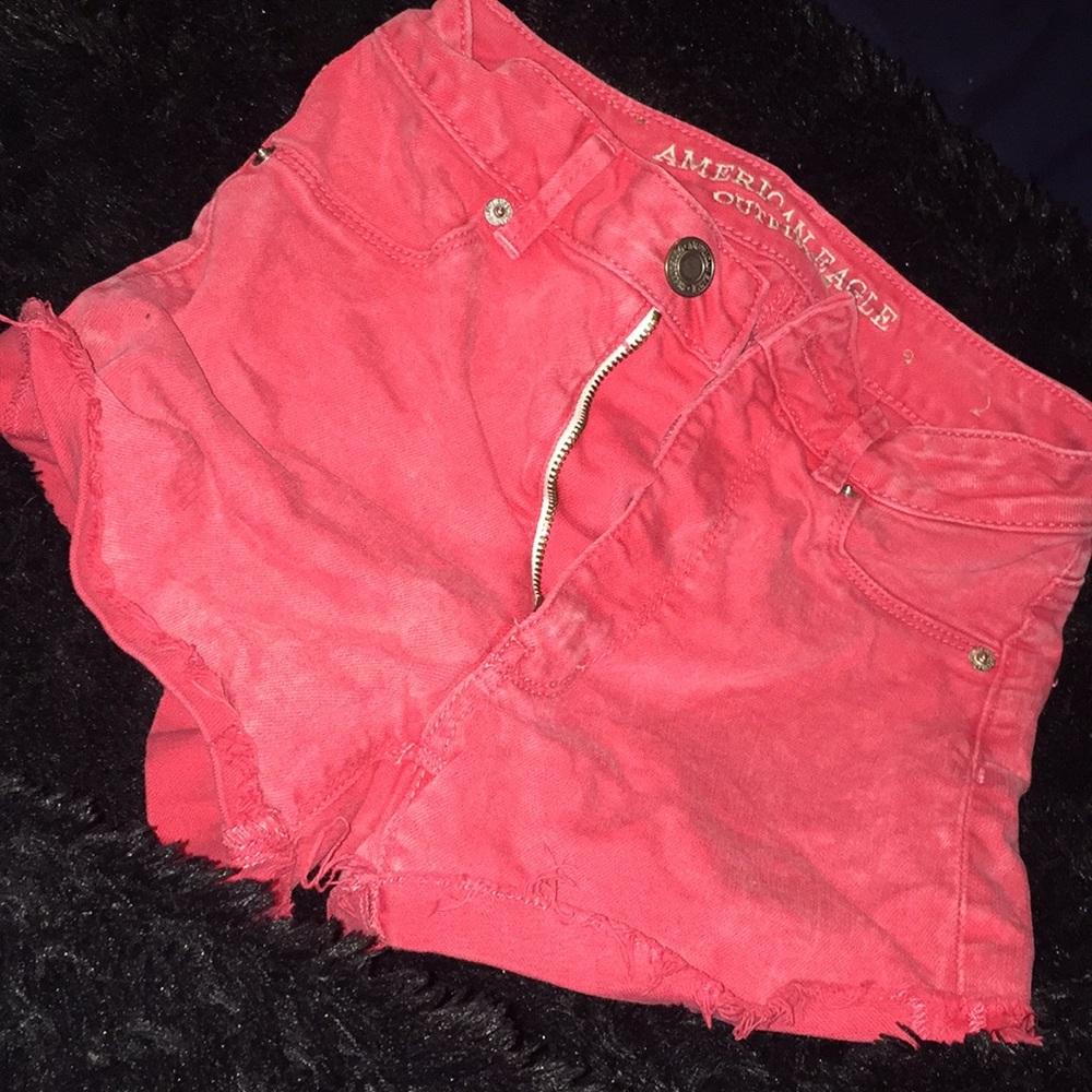 distressed pink ae shorts
